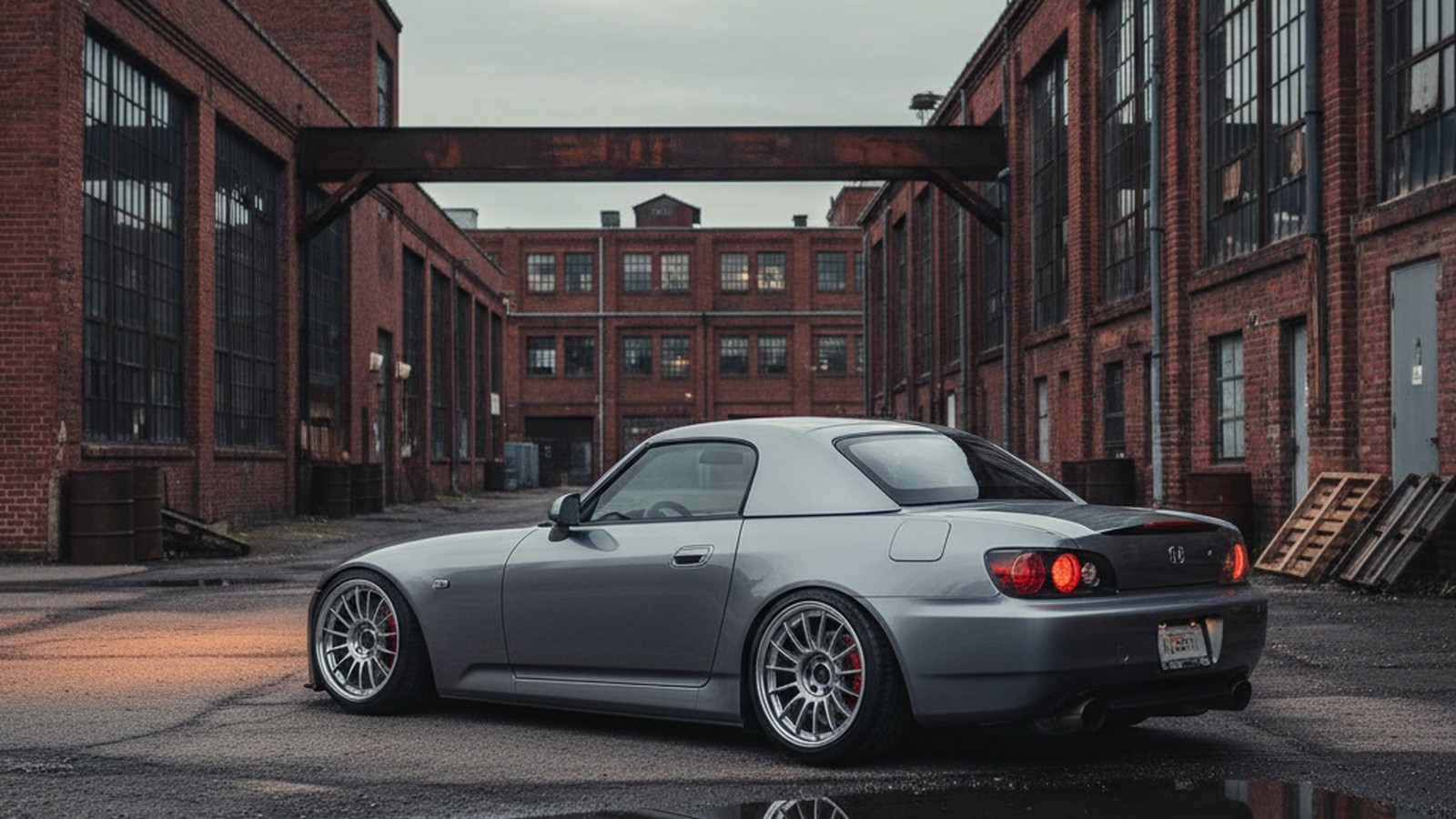 Honda S2000 on custom aftermarket wheels, front three-quarter view