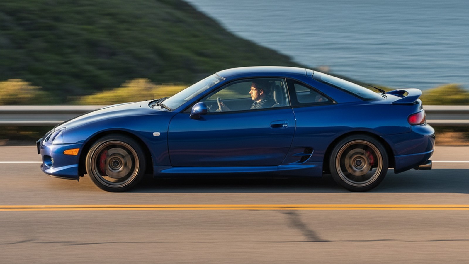 Mitsubishi FTO on custom aftermarket wheels, front three-quarter view