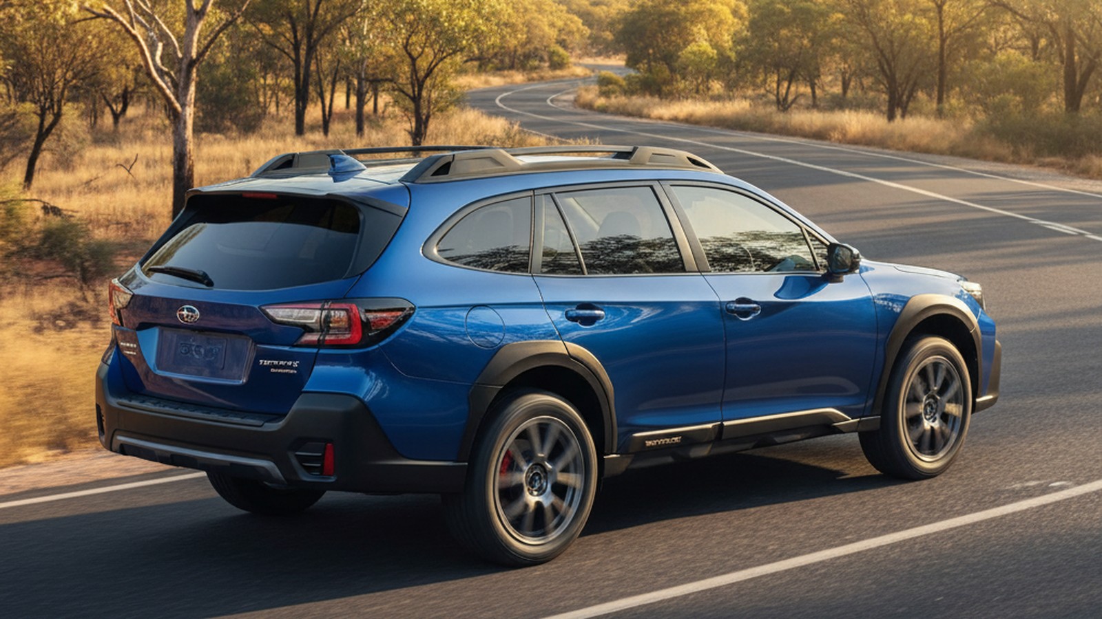 Subaru Outback XT on custom aftermarket wheels, front three-quarter view
